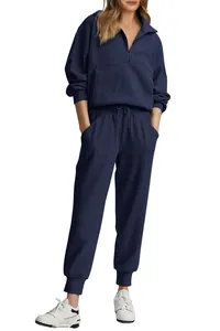 Detailed view of navy blue waffle knit half-zip sweatshirt and jogger set for women