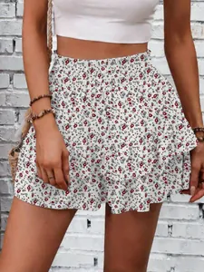Detail view of stylish summer high-waisted floral print skort with tiered ruffles