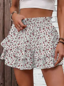 Close-up detail of women's floral print high waist wide-leg casual skirt pants