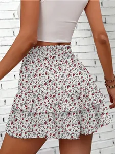 Detail back view of trendy floral tiered mini skort with elastic high waist for women