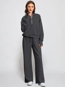 Women's two-piece lounge set with half-zip sweatshirt and wide-leg sweatpants