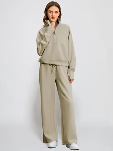 Two-piece women's casual set with a half-zip sweatshirt and wide-leg loungewear pants