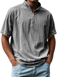 Macro detail of grey acid-wash men's polo shirt with stand collar and silver zipper