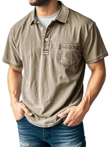 Macro view of men's washed khaki polo shirt with buttoned collar and chest pocket detail