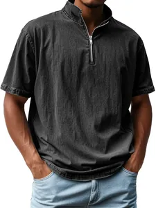 Close-up of vintage washed men's short sleeve shirt featuring a half-zip stand collar