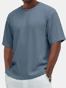 Detail shot of the vertical knit texture on a blue casual short sleeve T-shirt for men.