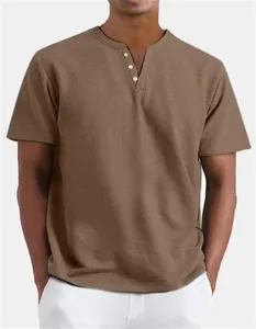 Detail showing the buttoned V-neck and fabric texture of a men's brown Henley shirt