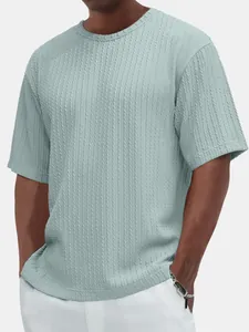 Detailed view of men's casual crew neck T-shirt featuring a unique cable knit texture