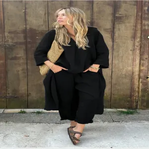 Χαλαρό γυναικείο σετ από βαμβάκι και λινό σε μαύρο χρώμα με μακρυμάνικο τοπ και παντελόνα