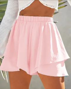 Detailed view of casual pink tiered ruffle skort with elastic waist for spring summer