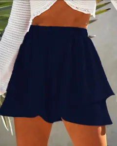 Close-up detail of navy blue tiered skort featuring a comfortable elastic high waistband