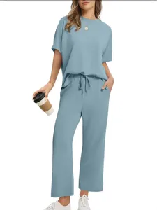 Casual women's two-piece lounge set with short sleeve top and wide leg pants in blue