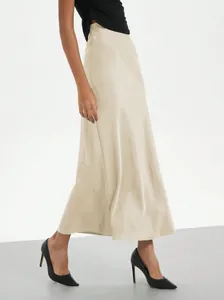 Side view of elegant champagne satin midi skirt with high waist and glossy finish