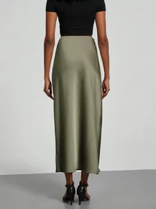 Back view of elegant olive green high waist satin maxi skirt with glossy finish
