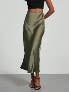 Elegant olive green high-waisted satin midi skirt with a lustrous silk-like finish.