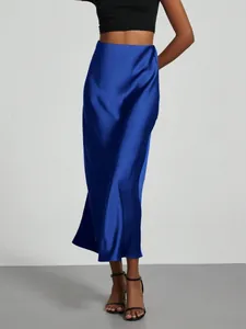 Elegant royal blue satin high-waist midi skirt with a glossy finish shown on model
