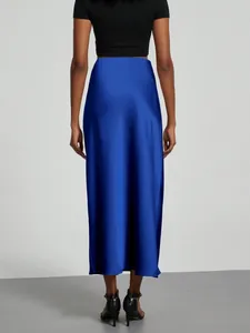 Back view of elegant royal blue satin high-waisted midi skirt with a glossy finish
