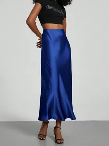 Elegant royal blue satin high-waisted maxi skirt with a smooth shimmering finish