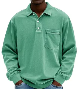 Detailed view of a green long-sleeve men's polo shirt with chest pocket and buttons.