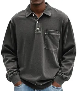 Close-up of men's washed vintage long-sleeved polo shirt with front pocket detail