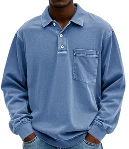 Detail view of men's casual long-sleeve polo shirt with buttons and chest pocket.