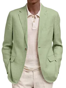 Close-up of a men's light green linen blazer with beige polo shirt for business casual look.