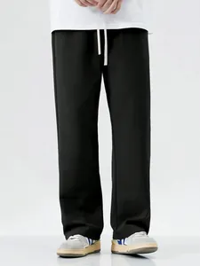 Men's loose black straight-leg casual pants featuring a comfortable drawstring waist