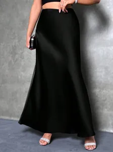 Elegant black high waist satin midi skirt with a silky glossy finish and smooth drape