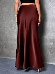 Back view of an elegant burgundy satin high-waisted maxi skirt featuring a silky sheen finish