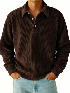 Macro view showing the detailed brown corduroy striped texture of men's vintage polo shirt