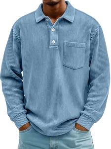 Detail of men's long-sleeve polo shirt with blue corduroy ribbed texture and chest pocket
