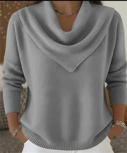 Elegant grey cowl neck knitted sweater with loose fit and textured waffle weave detail.