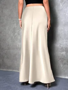 Detailed back view of a champagne satin high-waisted maxi skirt with elegant draping