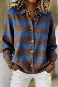 Close-up detail of women's button-down plaid knit cardigan with lapel and contrast colors