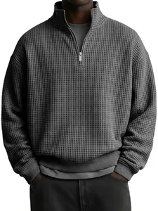 Men's casual grey waffle knit quarter-zip sweatshirt with a loose fit and ribbed cuffs