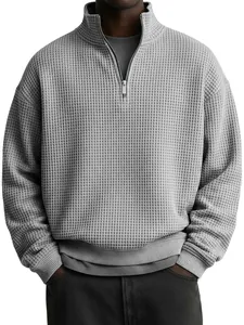 Men's loose waffle knit quarter-zip sweatshirt in grey for a casual autumn style