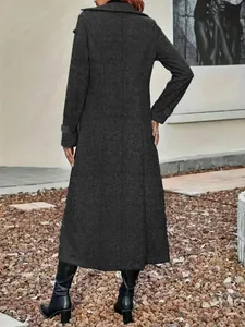 Full length back view of a dark charcoal textured wool coat for women in autumn winter