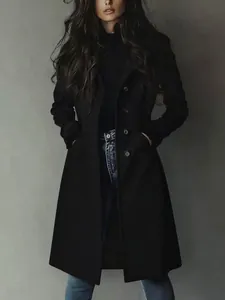 Stylish long black suede trench coat for women featuring a classic lapel and buttons