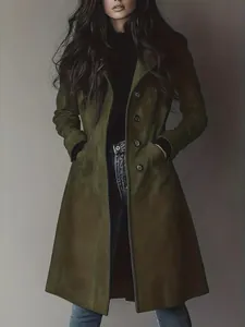 Long olive green suede trench coat for women featuring a minimalist autumn winter look