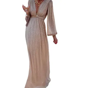 Elegant apricot sequin maxi dress with deep V-neck and long bell sleeves for party wear.