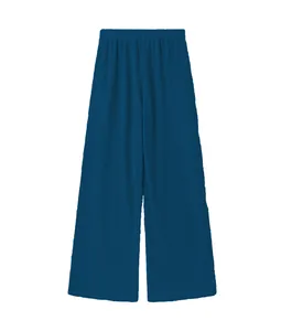 Detalle de alta calidad de pantalones de descanso azul oscuro de pierna ancha para mujer