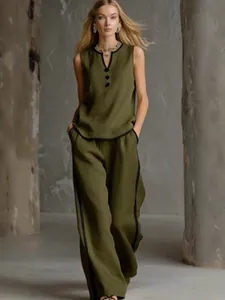Full body view of women's olive green sleeveless two-piece set with button details.