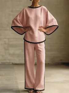 Elegant pink cotton linen two-piece set featuring batwing sleeves and wide-leg trousers
