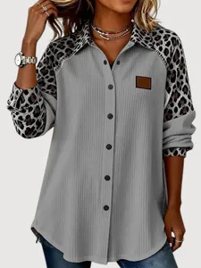Casual women's long sleeve shirt featuring leopard print stitching and ribbed texture.