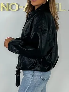 Detailed view of retro black faux leather bomber jacket with oversized fit and zipper