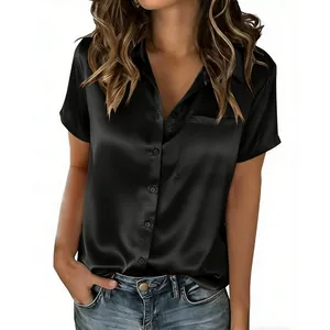 Close-up of elegant black short sleeve satin button-down shirt with a chest pocket