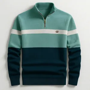 Detailed view of a men's color-blocked half-zip knit sweater with premium texture.