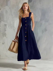 Elegant navy blue sleeveless midi dress with decorative buttons and flared skirt for summer