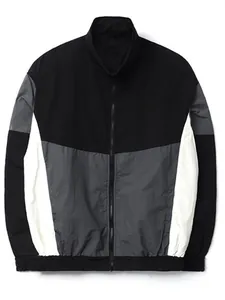 Chaqueta cortavientos de hombre con diseño color-block, cuello alto y cremallera frontal