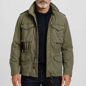 Close-up of olive green M65 field jacket with multiple utility pockets for men